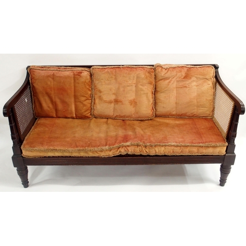 88A - A VICTORIAN EBONISED BERGERE SETTEE