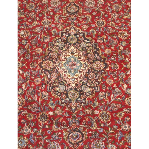 93 - A RED GROUND KESHAN RUG