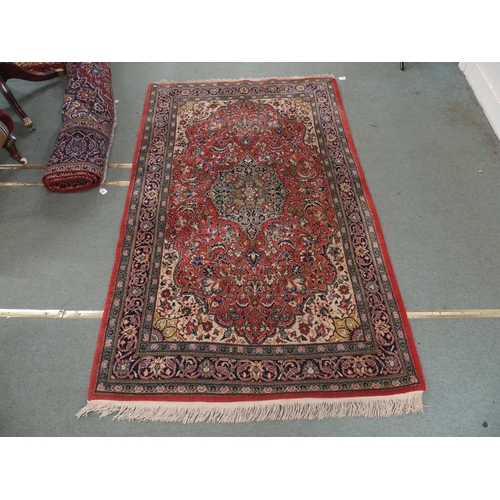 96 - A PINK GROUND SAROUGH RUG