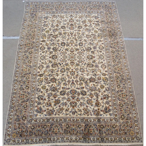 98 - A CREAM GROUND KESHAN RUG