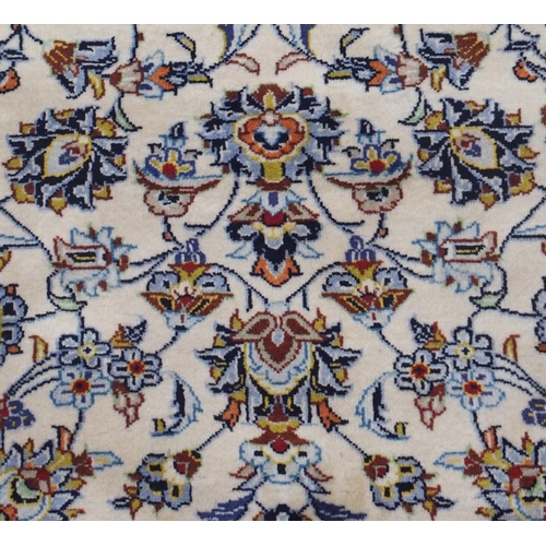 98 - A CREAM GROUND KESHAN RUG