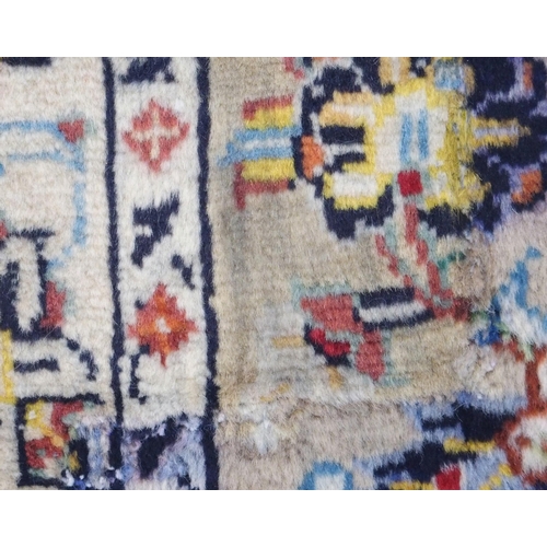 98 - A CREAM GROUND KESHAN RUG