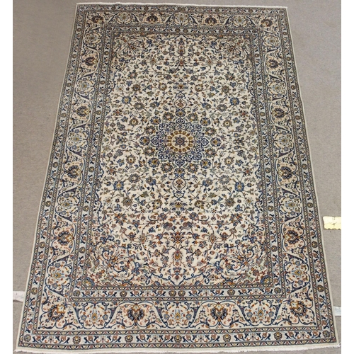 99 - A CREAM GROUND FINE KESHAN LAMBS WOOL RUG