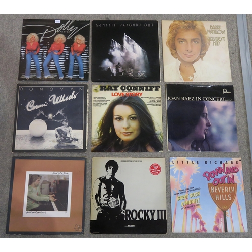 558 - A box of vinyl LP records with the Rocky III soundtrack, Dolly Parton, The Theme from Dallas, Genesi... 