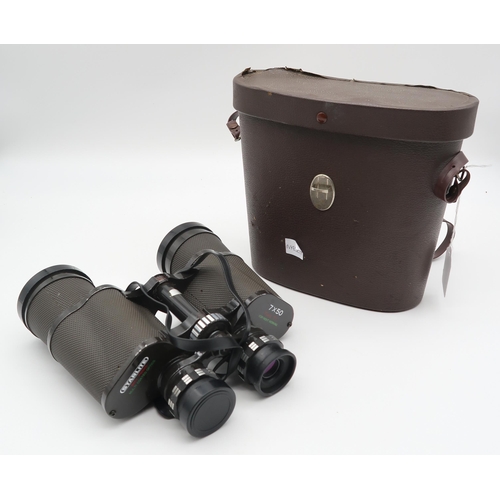 565 - A pair of Carl Zeis Jena Jenoptem 8x30 binoculars serial number 6537625 together with a pair of Star... 