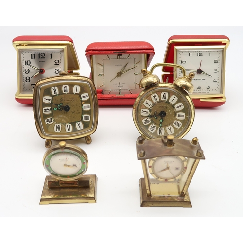 578 - A lot of travel clocks with Indur Deluxe, Westclock, Blessing, a purse etc