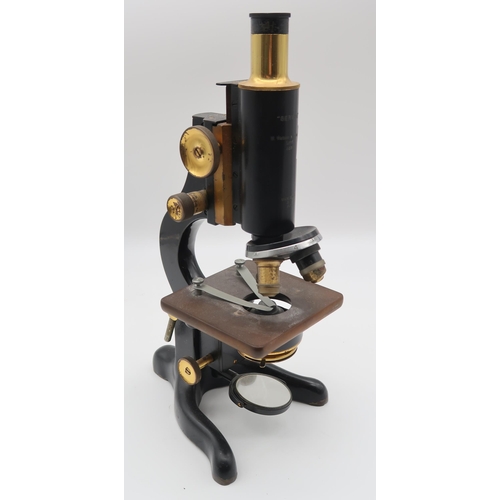 602 - A WATSON MICROSCOPE with additional optics, slides, fan case etc