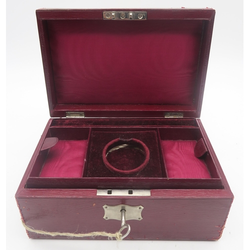 619A - A Victorian tooled leather jewellery box by Carlisle & Watts, Edinburgh, with velvet-lined fitte... 