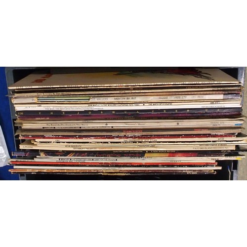 558A - A box of vinyl LP records with a good collection of Bob Marley and the Wailers, Bob Dylan, Meatloaf,... 