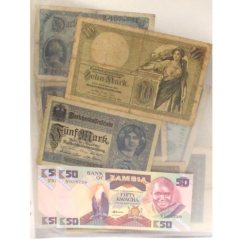 541 - A collection of bank notes with colonial examples, German, Dutch, Indonesian, Caribbean etc