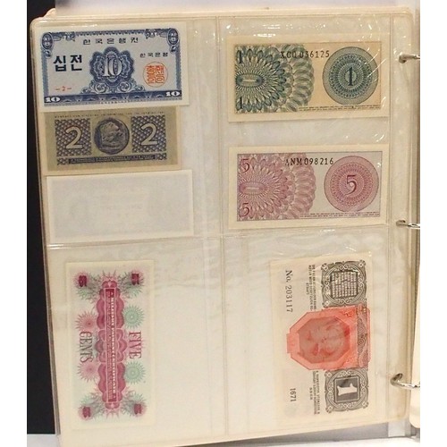 541 - A collection of bank notes with colonial examples, German, Dutch, Indonesian, Caribbean etc