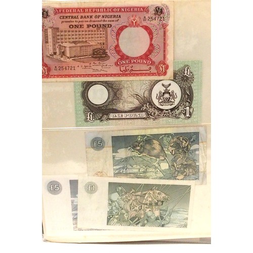 541 - A collection of bank notes with colonial examples, German, Dutch, Indonesian, Caribbean etc