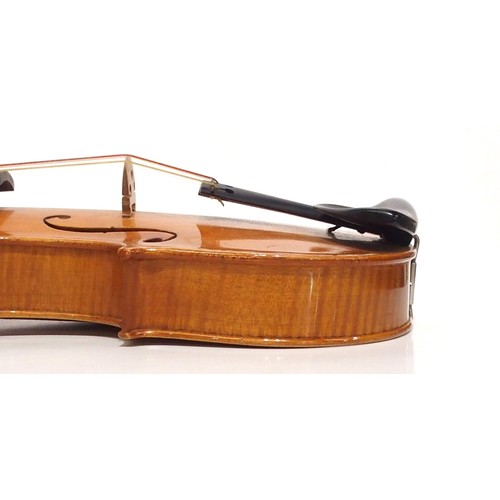 555 - A Conservatory London violin, two piece back 35.5cm with bow and case