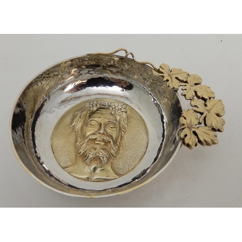 114 - A SILVER WINE OR WHISKY TASTING BOWL