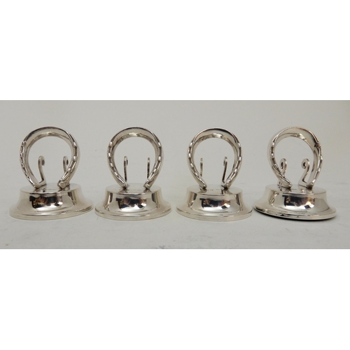 118 - A CASED SET OF FOUR SILVER PLACECARD OR MENU HOLDERS