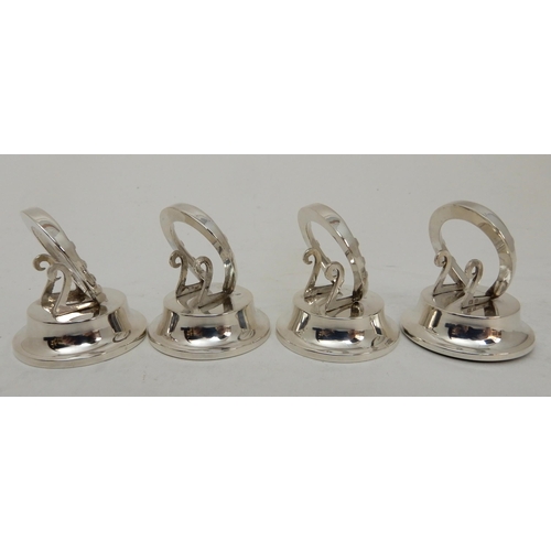 118 - A CASED SET OF FOUR SILVER PLACECARD OR MENU HOLDERS