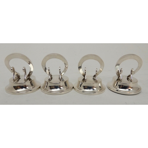 118 - A CASED SET OF FOUR SILVER PLACECARD OR MENU HOLDERS