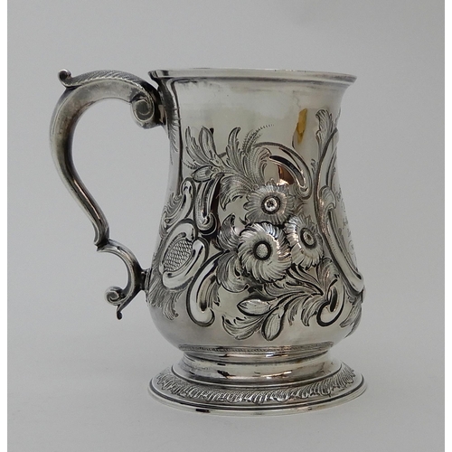 123 - A GEORGE II SILVER TANKARD