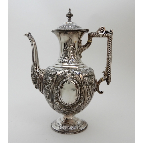 124 - A LATE VICTORIAN SILVER COFFEE POT