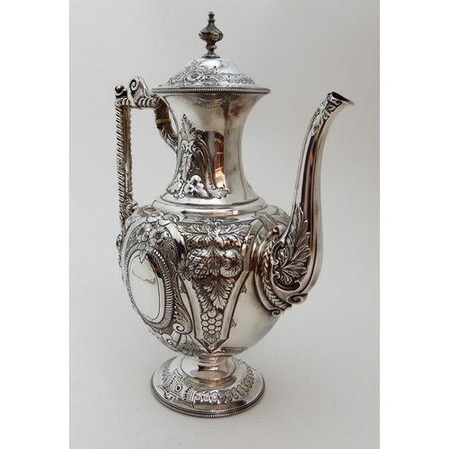 124 - A LATE VICTORIAN SILVER COFFEE POT