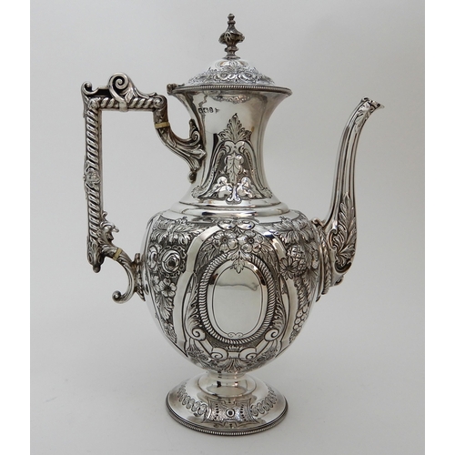 124 - A LATE VICTORIAN SILVER COFFEE POT