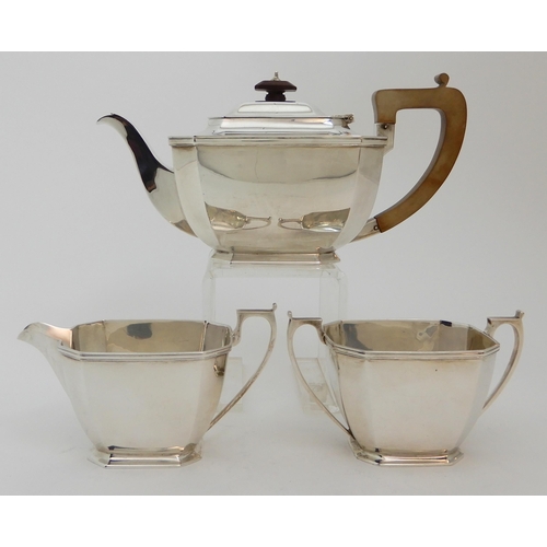 125 - A THREE PIECE SILVER TEA SERVICE