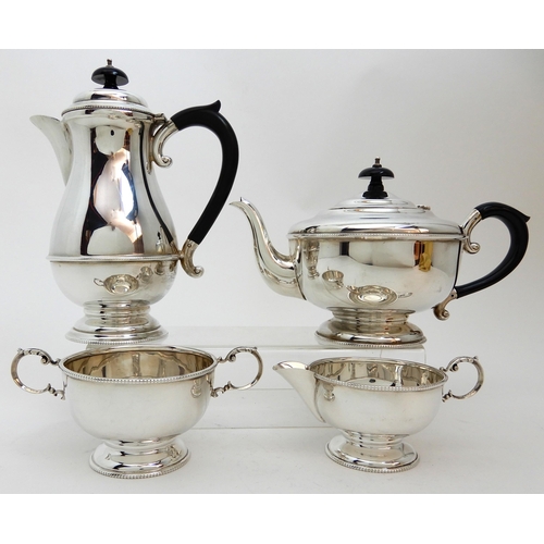 128 - A FOUR PIECE SILVER TEA SERVICE