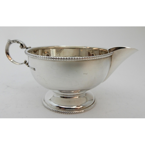 128 - A FOUR PIECE SILVER TEA SERVICE