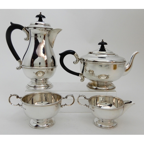 128 - A FOUR PIECE SILVER TEA SERVICE