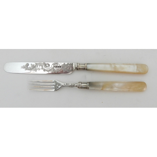 130 - A TWENTY FOUR PIECE SILVER AND MOTHER OF PEARL DESSERT CUTLERY SET