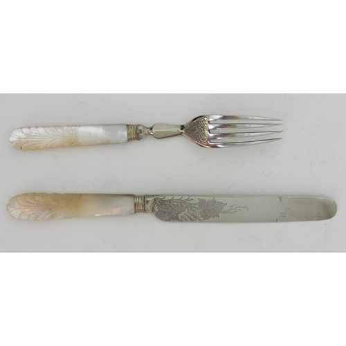 130 - A TWENTY FOUR PIECE SILVER AND MOTHER OF PEARL DESSERT CUTLERY SET