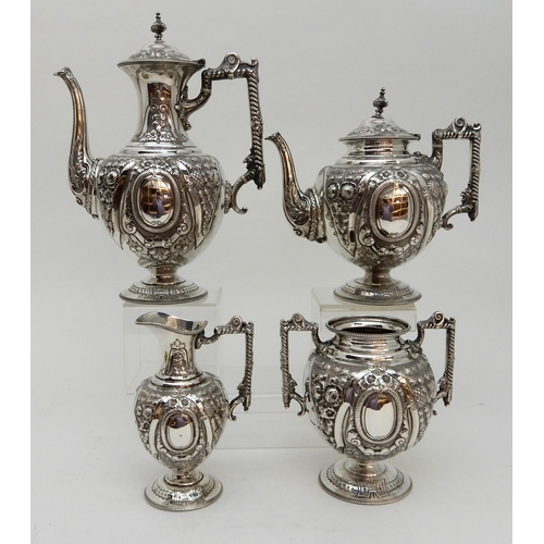 142 - AN EDWARDIAN FOUR PIECE SILVER TEA AND COFFEE SERVICE