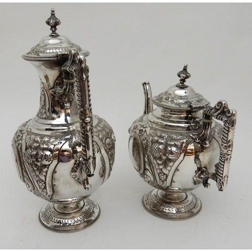 142 - AN EDWARDIAN FOUR PIECE SILVER TEA AND COFFEE SERVICE