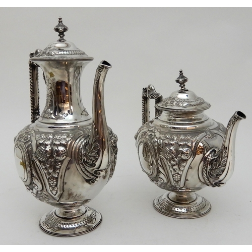 142 - AN EDWARDIAN FOUR PIECE SILVER TEA AND COFFEE SERVICE