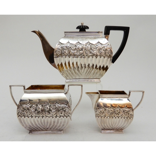 145 - A BACHELOR'S THREE PIECE SILVER TEA SERVICE