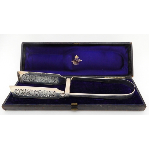 149 - A CASED PAIR OF SILVER ASPARAGUS TONGS