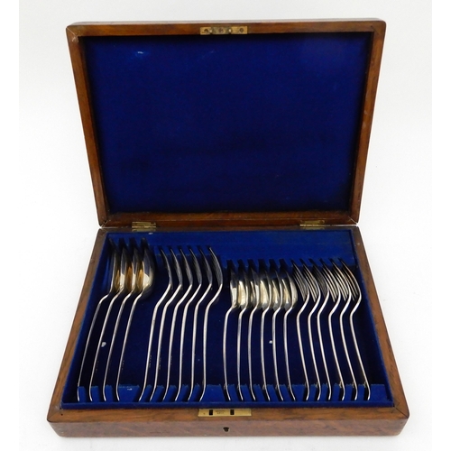 150 - A CASED SET OF SILVER CUTLERY