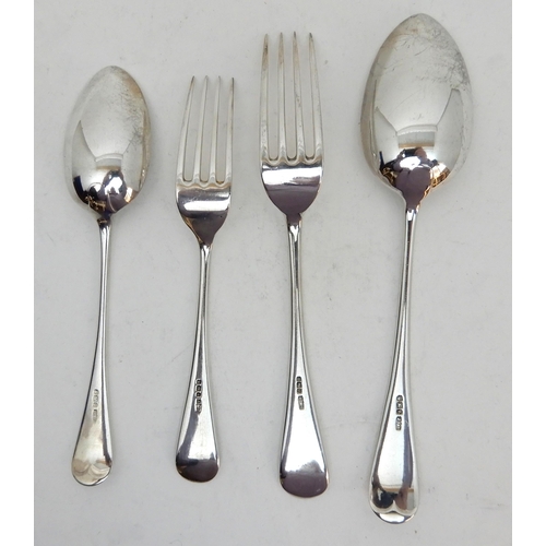 150 - A CASED SET OF SILVER CUTLERY