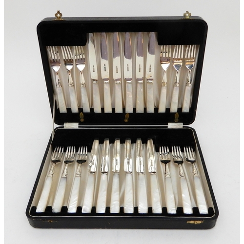 151 - A CASED 24-PIECE SILVER AND MOTHER OF PEARL DESSERT CUTLERY SET