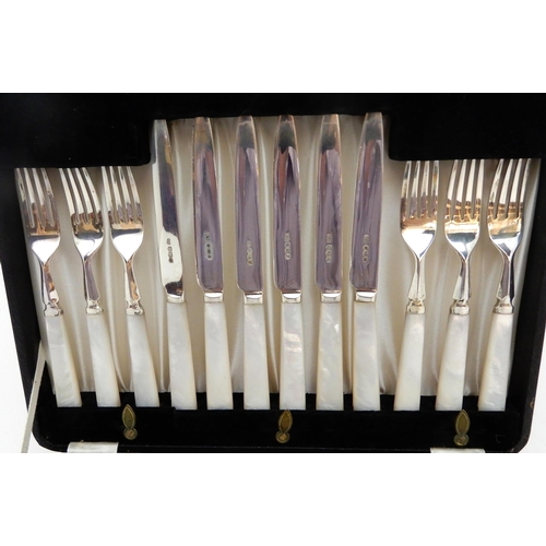 151 - A CASED 24-PIECE SILVER AND MOTHER OF PEARL DESSERT CUTLERY SET