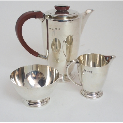 153 - A THREE PIECE SILVER COFFEE SET