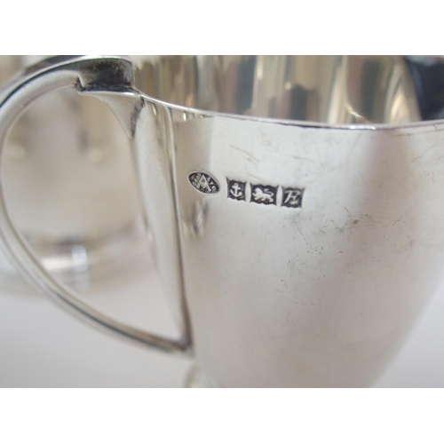 153 - A THREE PIECE SILVER COFFEE SET