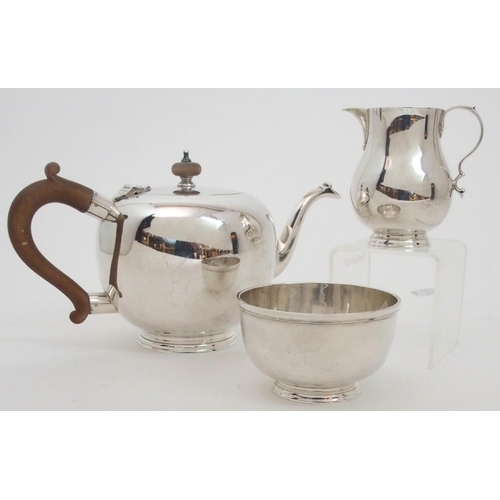 154 - A TWO PIECE SILVER TEA SERVICE