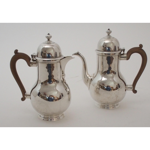 155 - A THREE PIECE SILVER CAFE AU LAIT SET