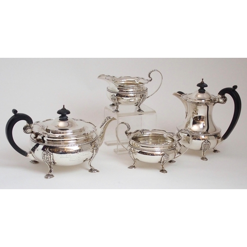 157 - A FOUR PIECE SILVER TEA SERVICE