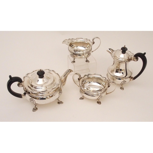 157 - A FOUR PIECE SILVER TEA SERVICE