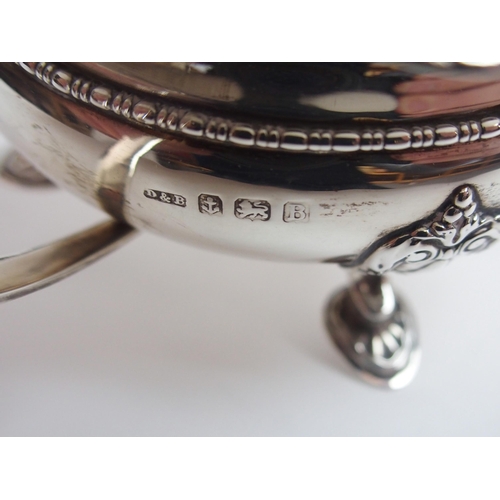 157 - A FOUR PIECE SILVER TEA SERVICE