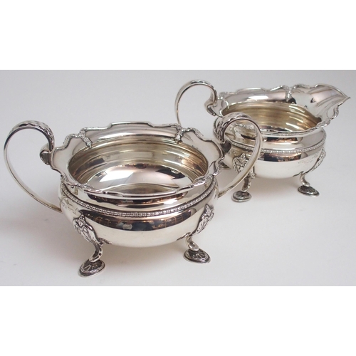 157 - A FOUR PIECE SILVER TEA SERVICE