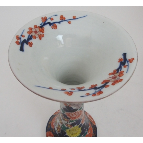 18 - AN IMARI BOTTLE SHAPED VASE