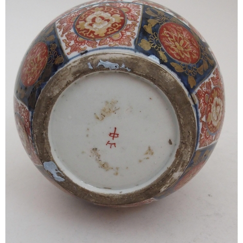 18 - AN IMARI BOTTLE SHAPED VASE